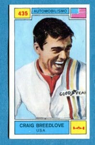 Vintage trading card of Craig Breedlove smiling in a striped Goodyear jacket, with U.S. flag, #435, his name and country shown.