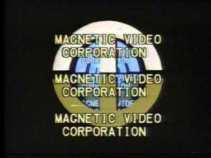 A video title card reading MAGNETIC VIDEO CORPORATION appears three times in stacked rows over a dark background with a circular graphic in the middle featuring a blue and yellow design. The text partially obscures the graphic.