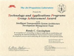 A Jet Propulsion Laboratory award certificate for Randy C. Cassingham’s leadership in ITS Architecture, signed, dated 1995.