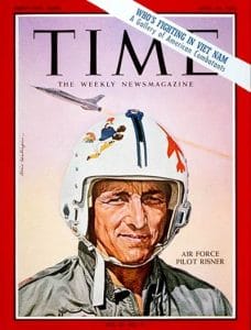 Cover of Time magazine featuring Air Force pilot Risner in a helmet and flight suit, with jet illustrations. A banner reads, Whos fighting in Viet Nam: A gallery of American combatants.