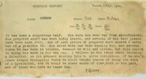 A typed report card from 1949 with handwritten notes, criticizing a student named Gurdon for poor biology work. The text mentions low marks, torn pieces, and doubts about his future as a scientist.