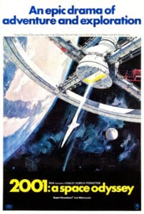 Poster for 2001: A Space Odyssey showing a large circular space station orbiting Earth, with a spacecraft approaching. The text reads, An epic drama of adventure and exploration.